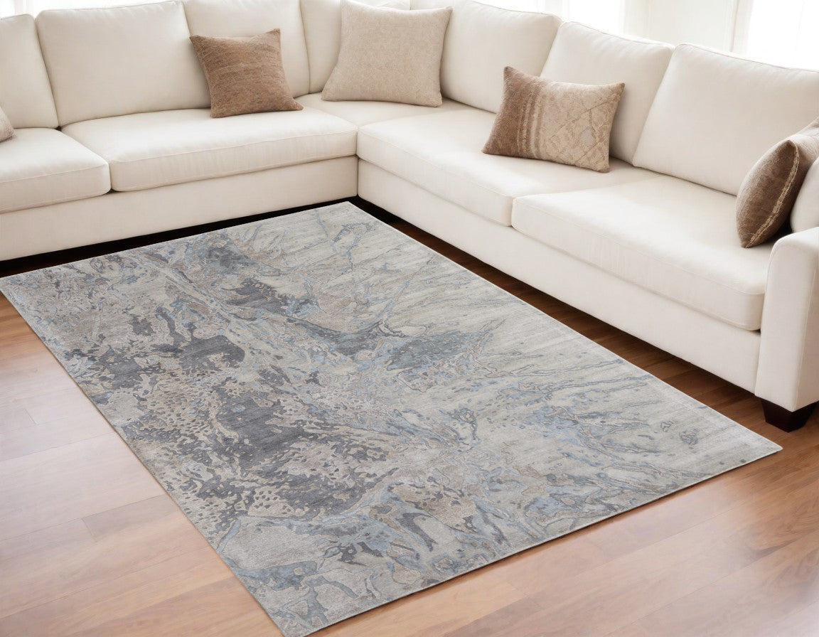 4' X 6' Ivory Taupe and Green Abstract Hand Tufted Worn Faded Area Rug