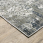6' X 9' Ivory Grey Blue And Taupe Abstract Power Loom Stain Resistant
