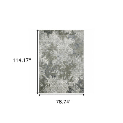 6' X 9' Ivory Grey Blue And Taupe Abstract Power Loom Stain Resistant
