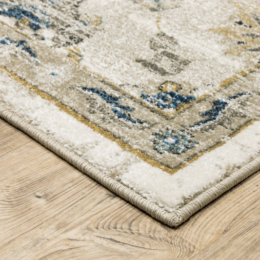 6' X 9' Beige Gold Blue And Grey Oriental Power Loom Stain Resistant