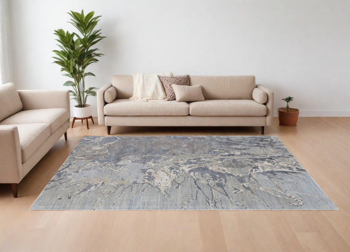 4' X 6' Ivory Taupe and Green Abstract Hand Tufted Worn Faded Area Rug