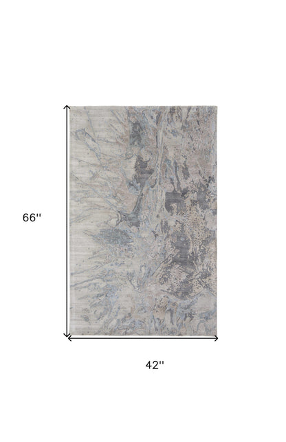 4' X 6' Ivory Taupe and Green Abstract Hand Tufted Worn Faded Area Rug