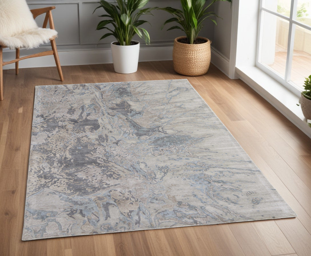 4' X 6' Ivory Taupe and Green Abstract Hand Tufted Worn Faded Area Rug