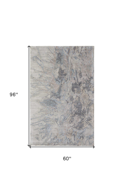 4' X 6' Ivory Taupe and Green Abstract Hand Tufted Worn Faded Area Rug