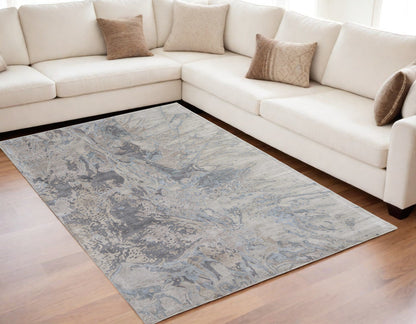 4' X 6' Ivory Taupe and Green Abstract Hand Tufted Worn Faded Area Rug