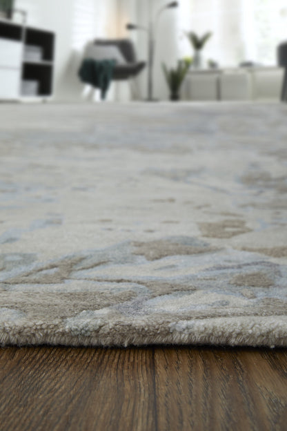 4' X 6' Ivory Taupe and Green Abstract Hand Tufted Worn Faded Area Rug