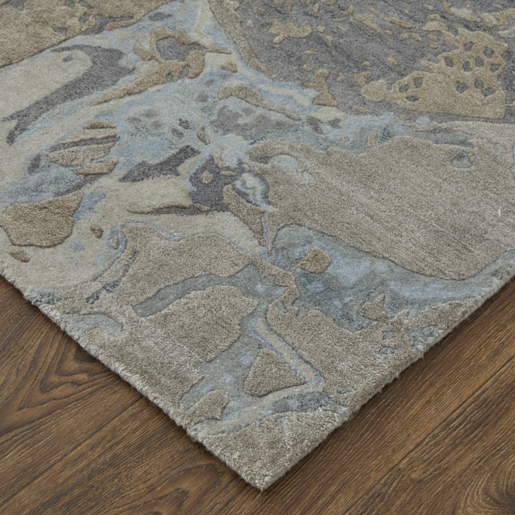 4' X 6' Ivory Taupe and Green Abstract Hand Tufted Worn Faded Area Rug