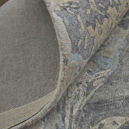 4' X 6' Ivory Taupe and Green Abstract Hand Tufted Worn Faded Area Rug