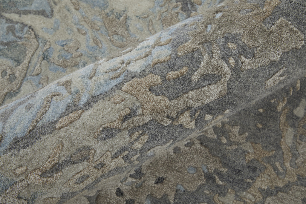 4' X 6' Ivory Taupe and Green Abstract Hand Tufted Worn Faded Area Rug