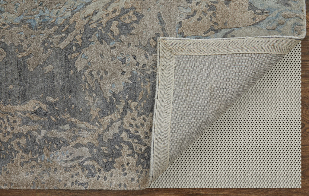 4' X 6' Ivory Taupe and Green Abstract Hand Tufted Worn Faded Area Rug