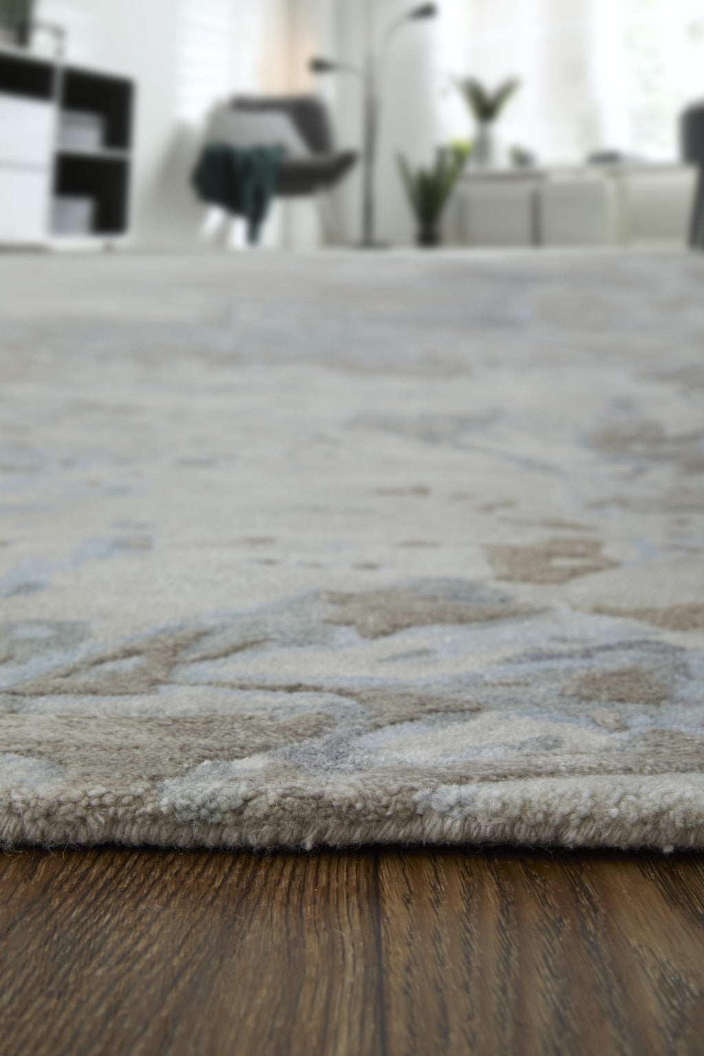 4' X 6' Ivory Taupe and Green Abstract Hand Tufted Worn Faded Area Rug